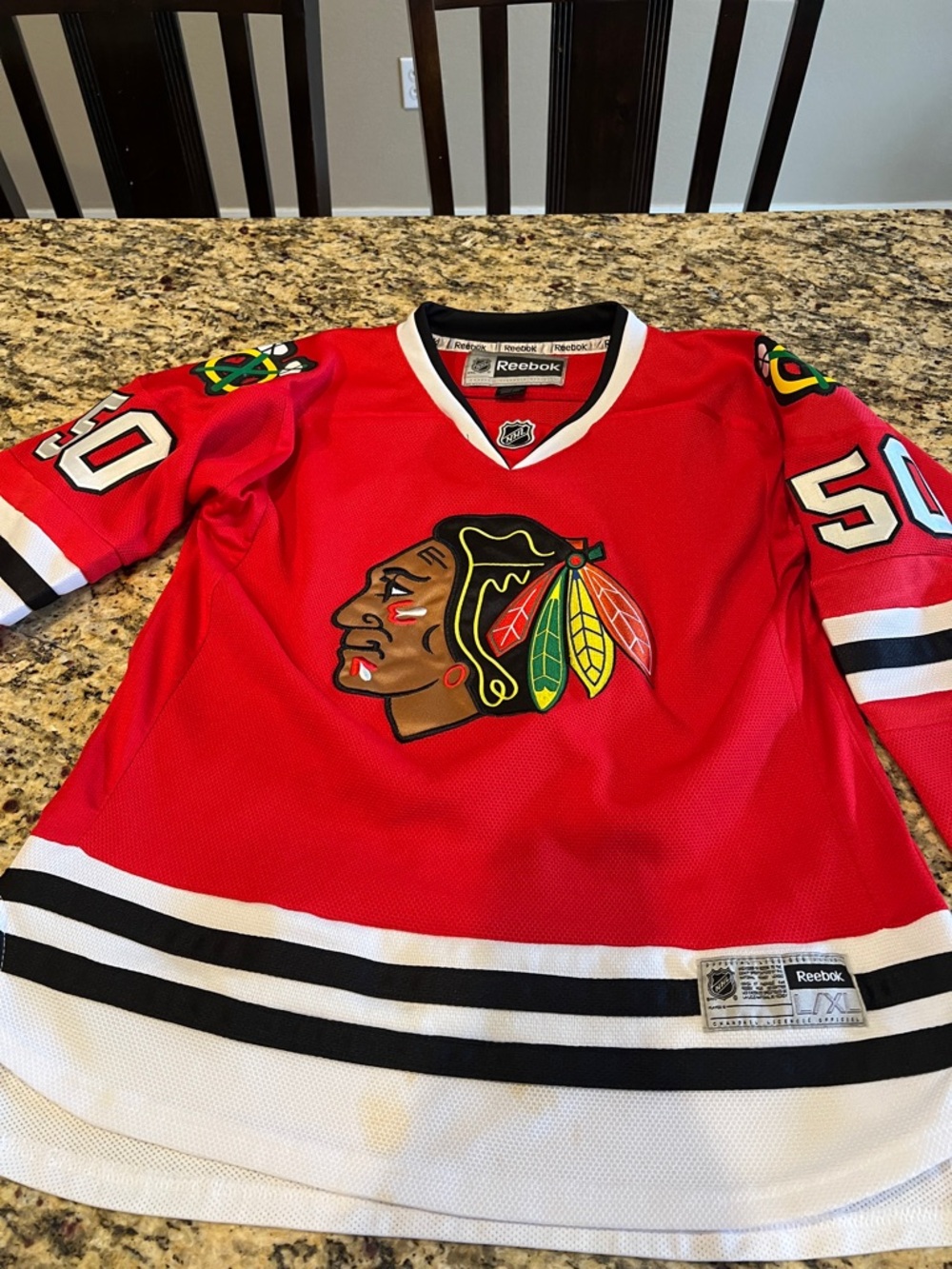 Reebok Red Chicago Blackhawks Crawford Hockey Jersey with Multicolor Logo Youth